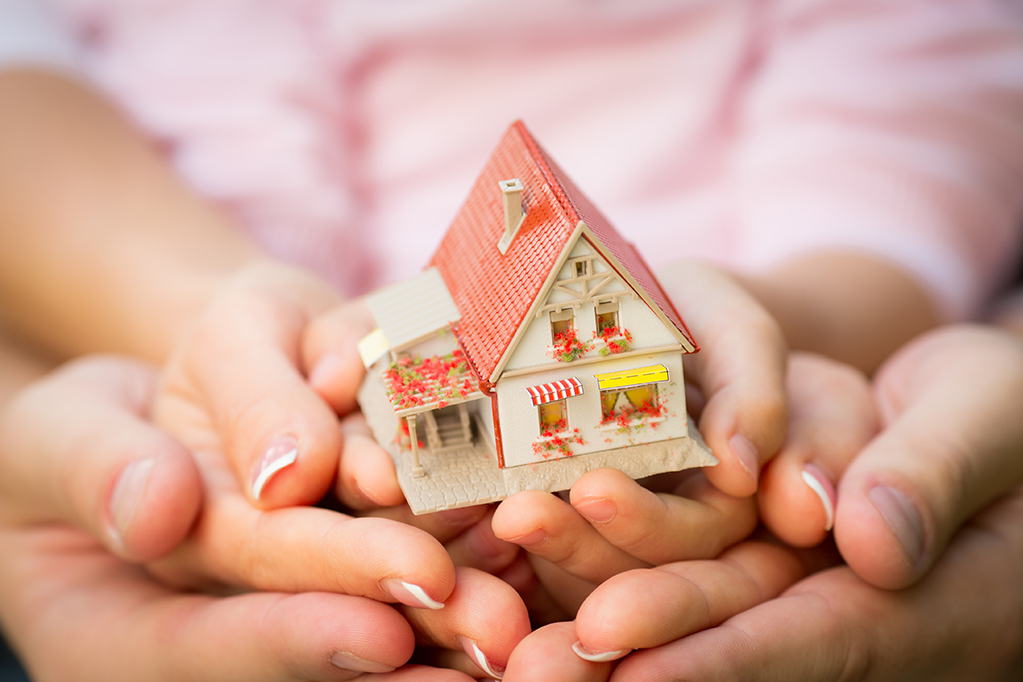 Family holding house